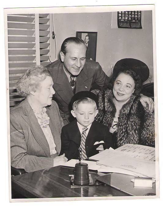 Bud Abbott and his wife Betty adopting his son, Bud Jr.