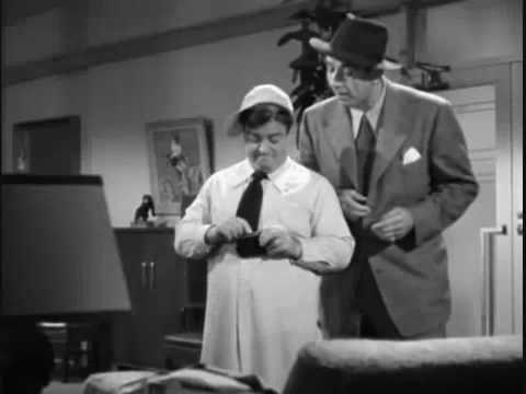 Bud and Lou doing the "I bet you that you're no t here" routine on the gangster that's guarding them