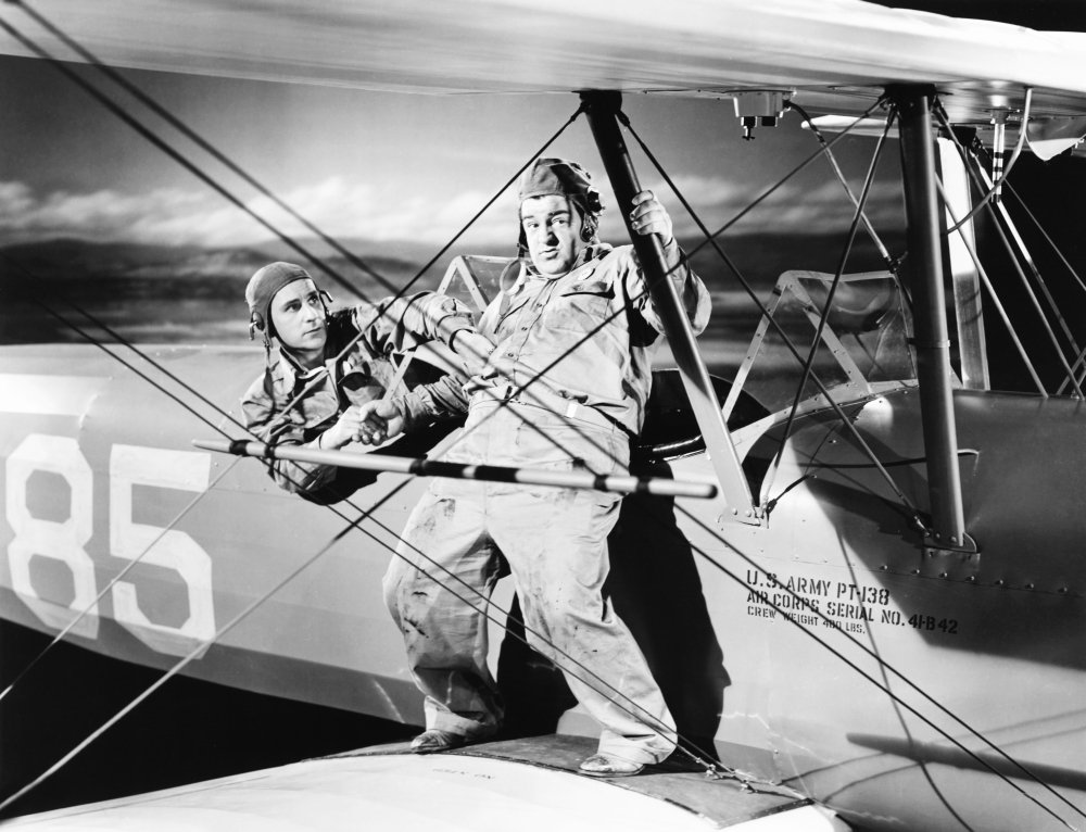 Lou Costello on the wing of a biplane in Keep 'Em Flying