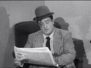 Lou Costello reading a newspaper in Wife Wanted
