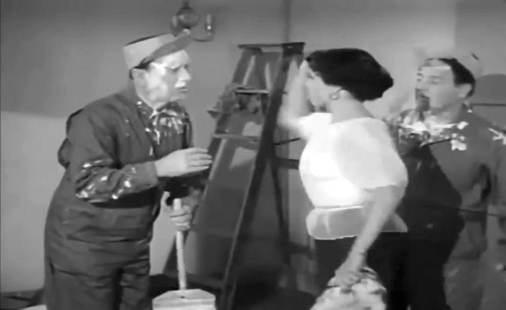 Bud Abbott gets slapped by the lady who's skirt Lou Costello unwittingly grabbed