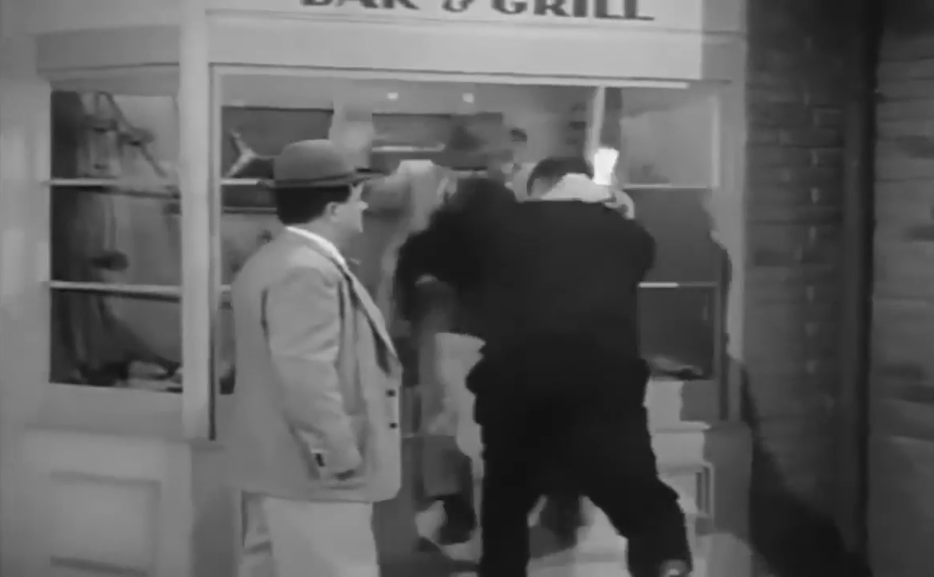 Bud Abbott gets thrown through the window of Brody's Seafood Bar & Grill - his payment for his scheme