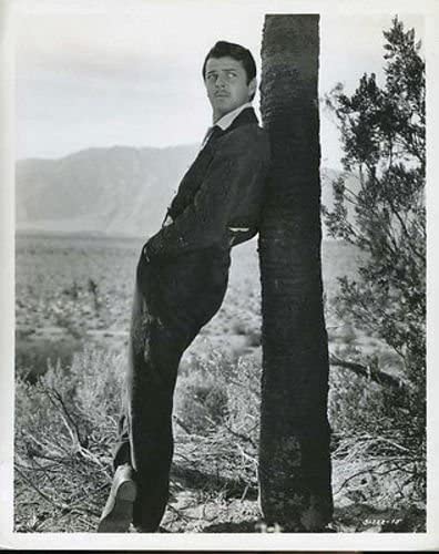John Carroll the male protagonist in "Rio Rita"