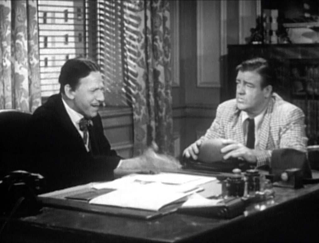Lawyer Mr. Sidney (Sid Fields) consults with his new client, Lou Costello