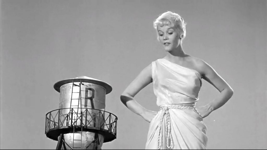 Emmy Lou (Dorothy Provine) standing up to her uncle in "The Thirty Foot Bride of Candy Rock"