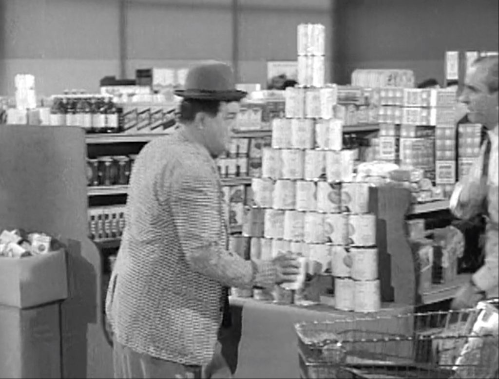 Lou Costello and the stack of cans at the grocery store in "Hillary's Birthday"