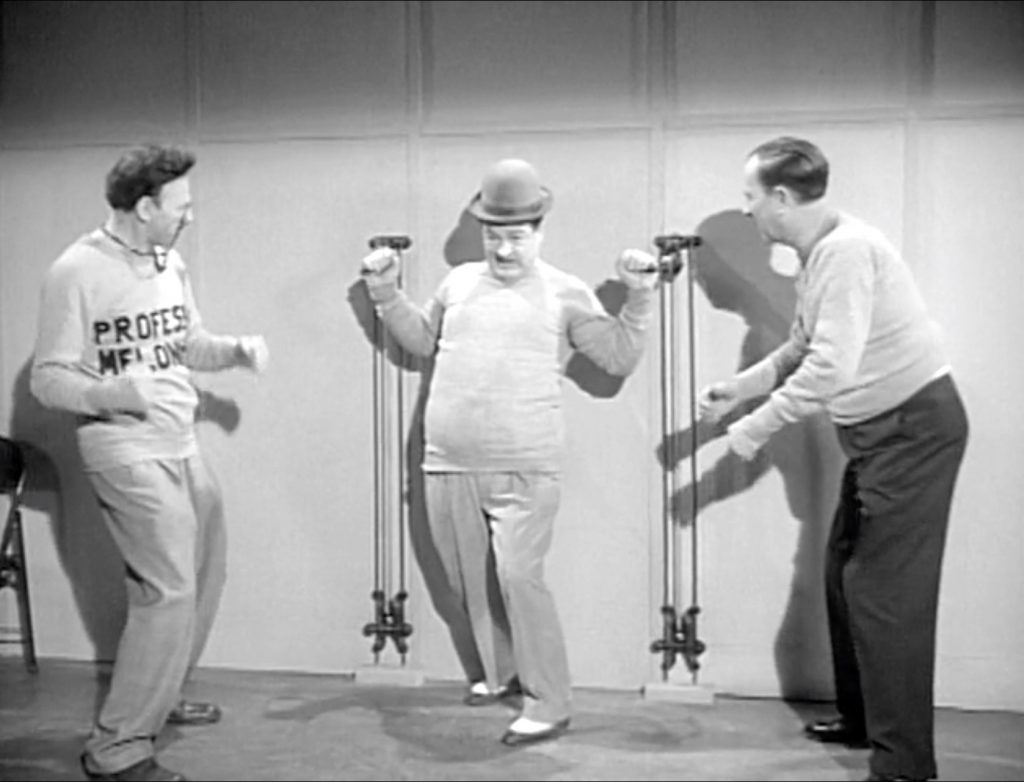Lou Costello pulling weights in "Police Rookies"