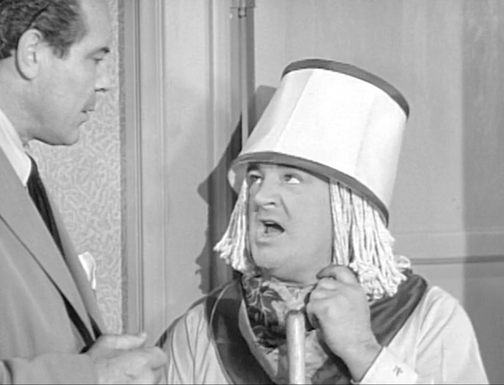 Lou Costello in disguise, hiding from Killer King, after trying to help Killer's wife