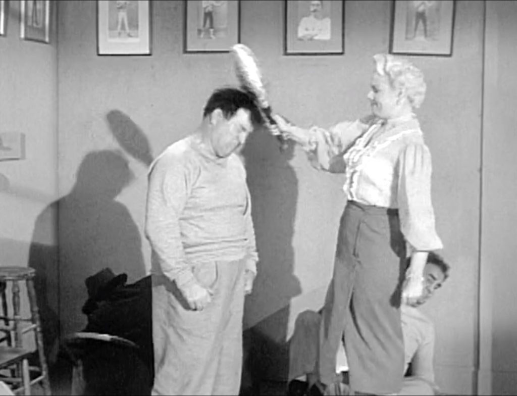 "You big bully!"  Killer's wife knocking Lou Costello unconscious