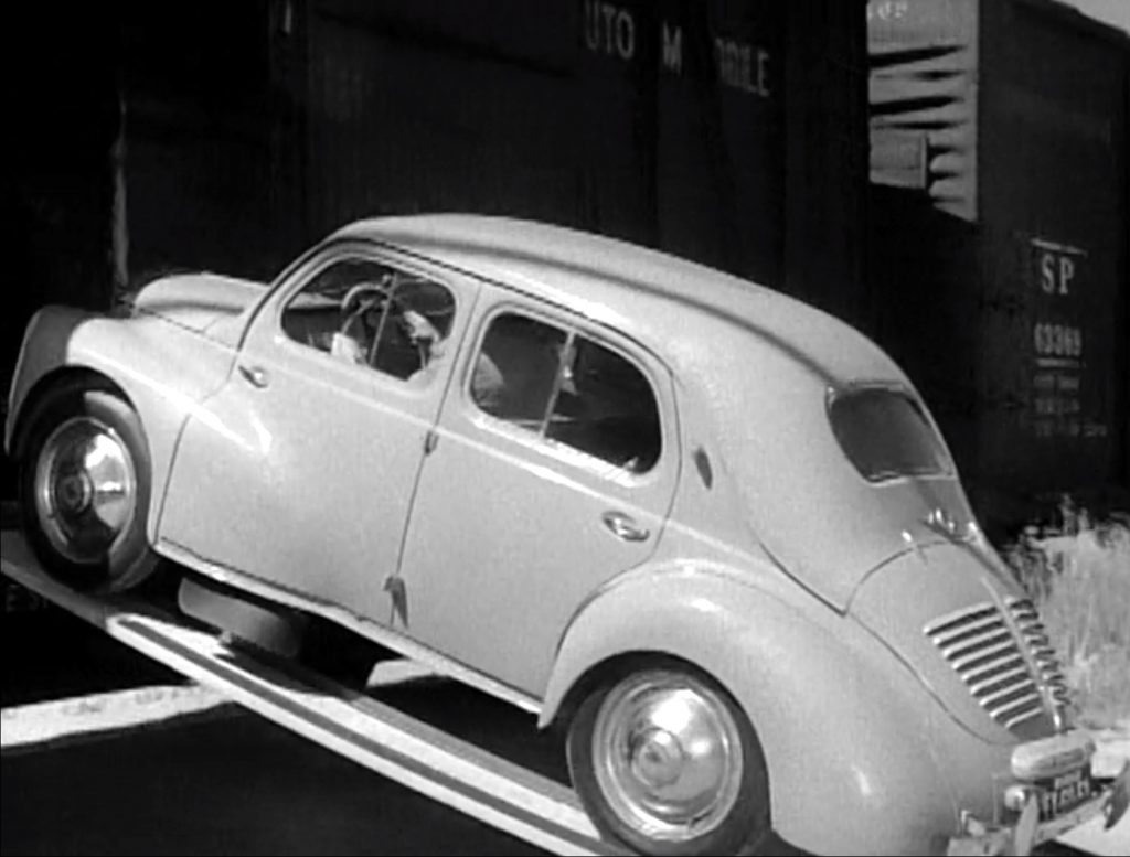 Lou drives the car up the improvised ramp in "Car Trouble"