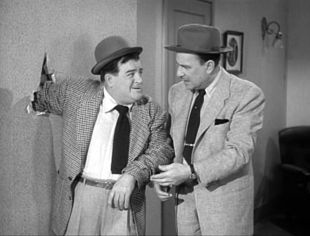 Hole in the wall - with Lou Costello's arm, as Bud Abbott's complaining