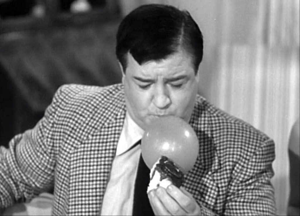 Lou Costello trying to eat the 'ladyfingers surprise cake' in "Efficiency Experts"