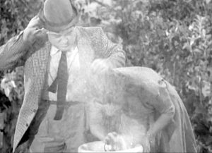 Lou Costello tries to help a pretty young lady at the water fountain - "Wife Wanted"