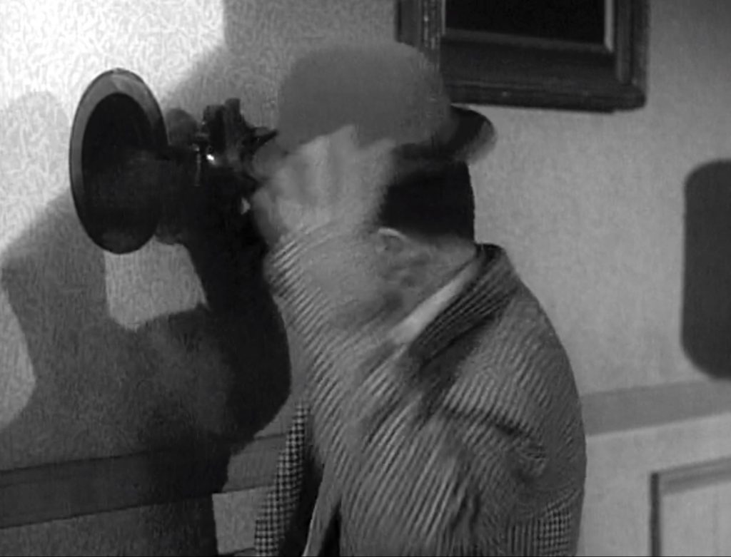 Lou Costello punched by the wall safe
