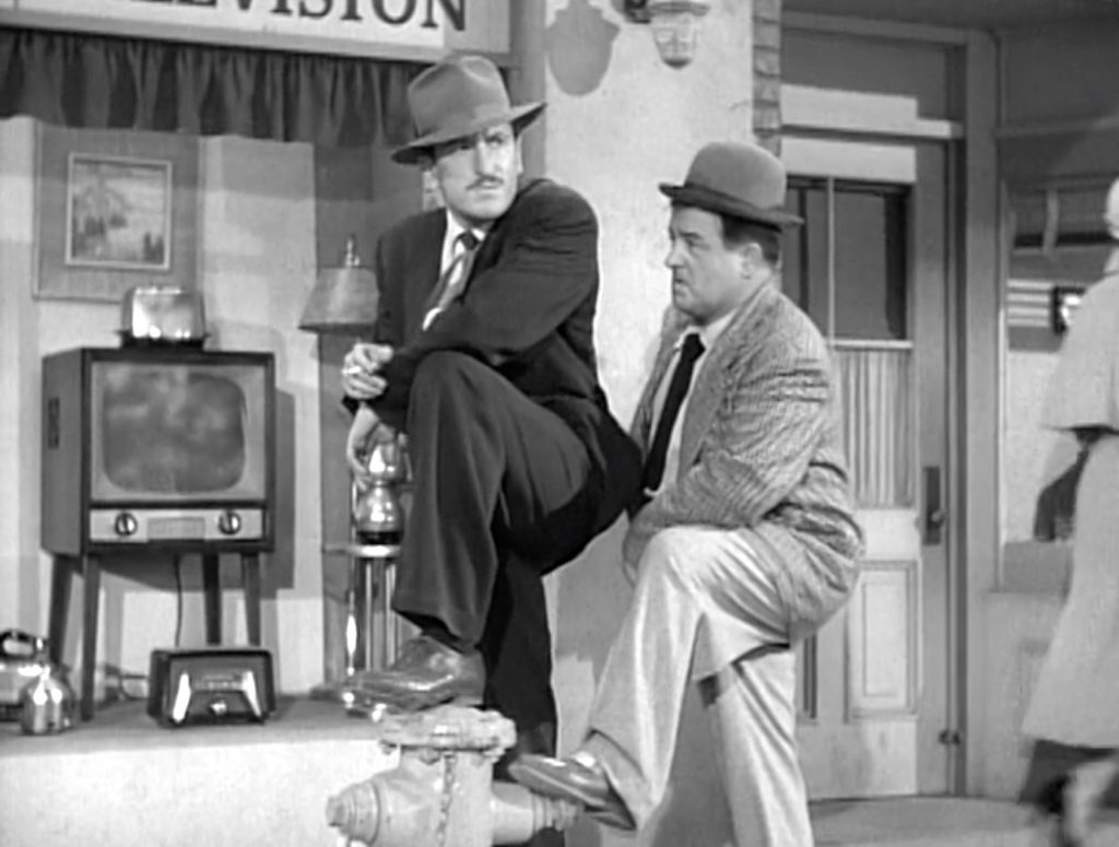 Lou Costello trailing a suspicious character in "Private Eye"