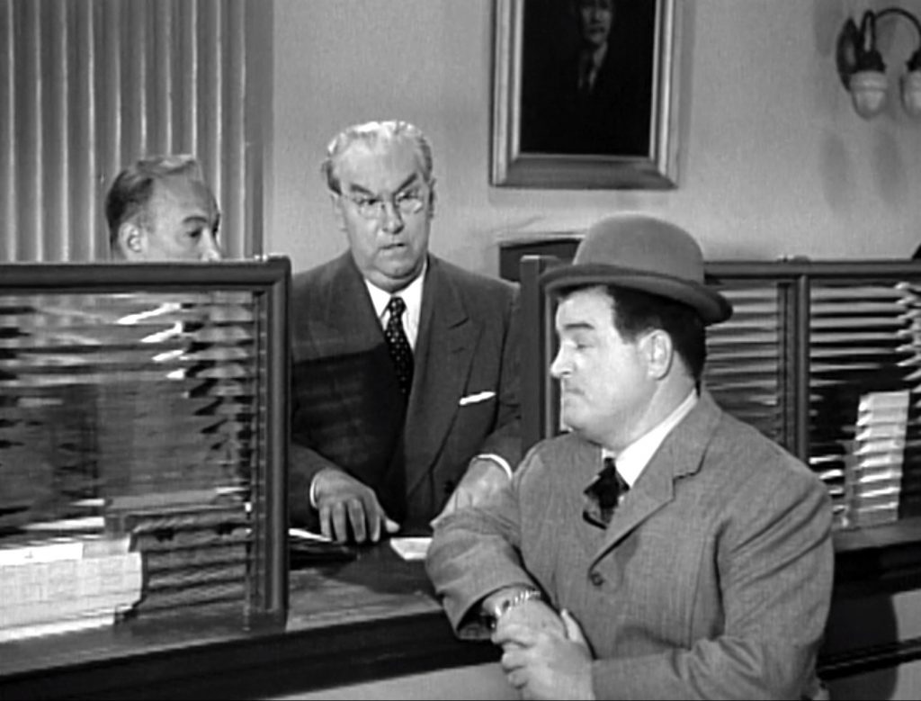 Lou Costello goes to get a loan at the bank - but they think it's another holdup!