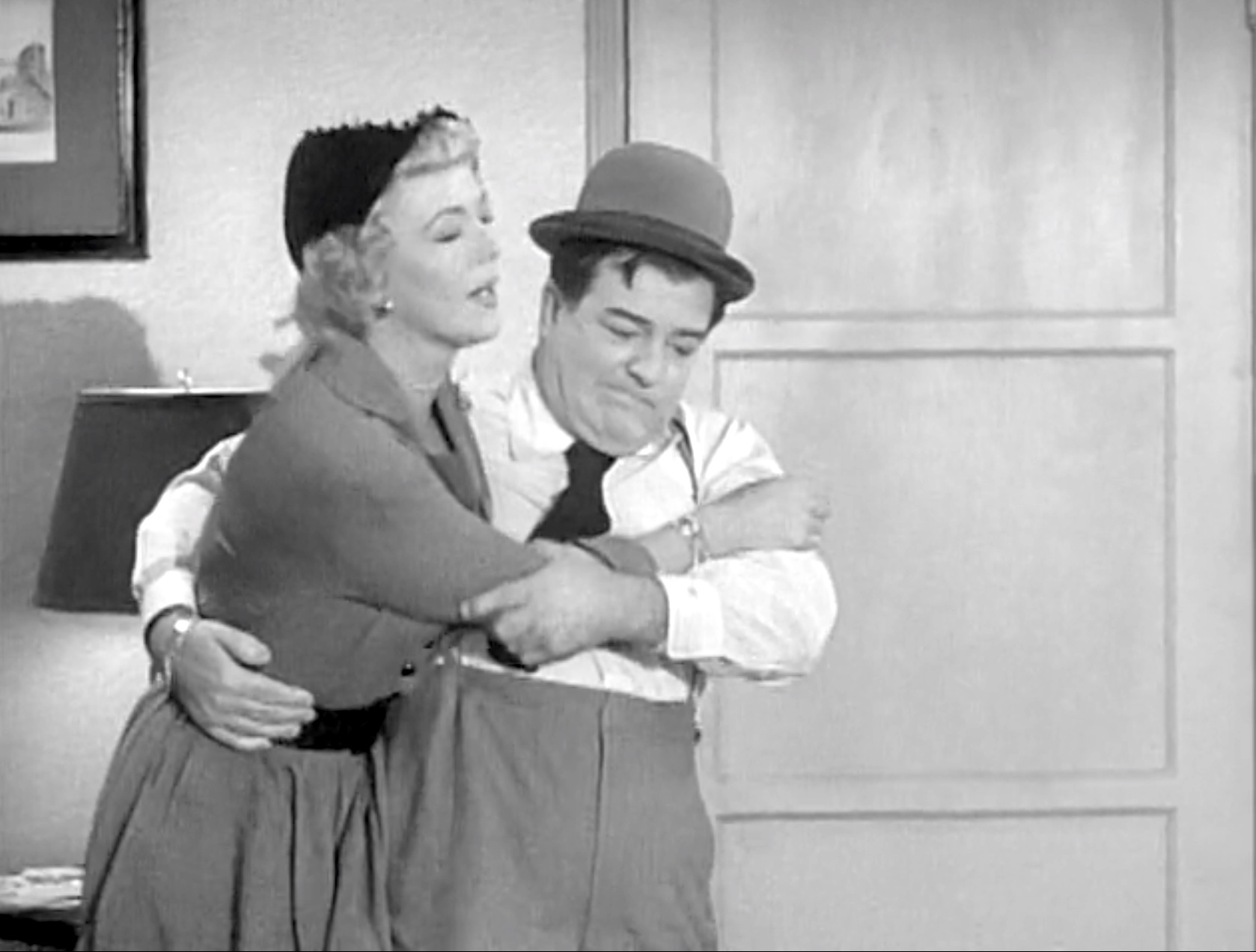 Lou Costello trying to walk the sleepy Fifi back to her apartment