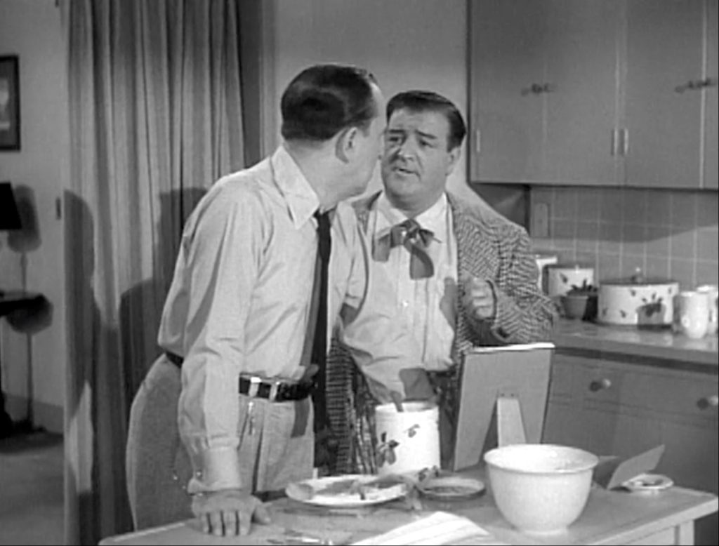 Bud Abbott helps Lou Costello propose to Sally in "Honeymoon House"