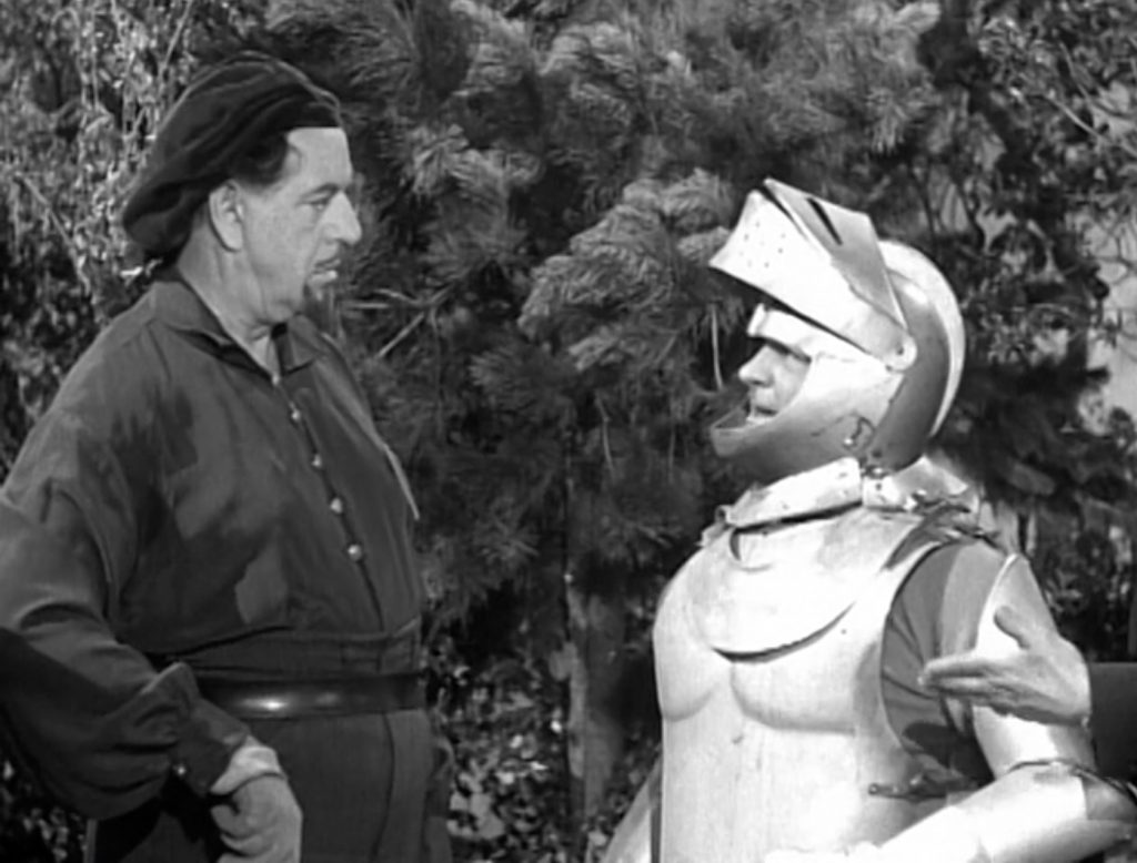 Professor Roberto annoyed by Lou Costello in armor
