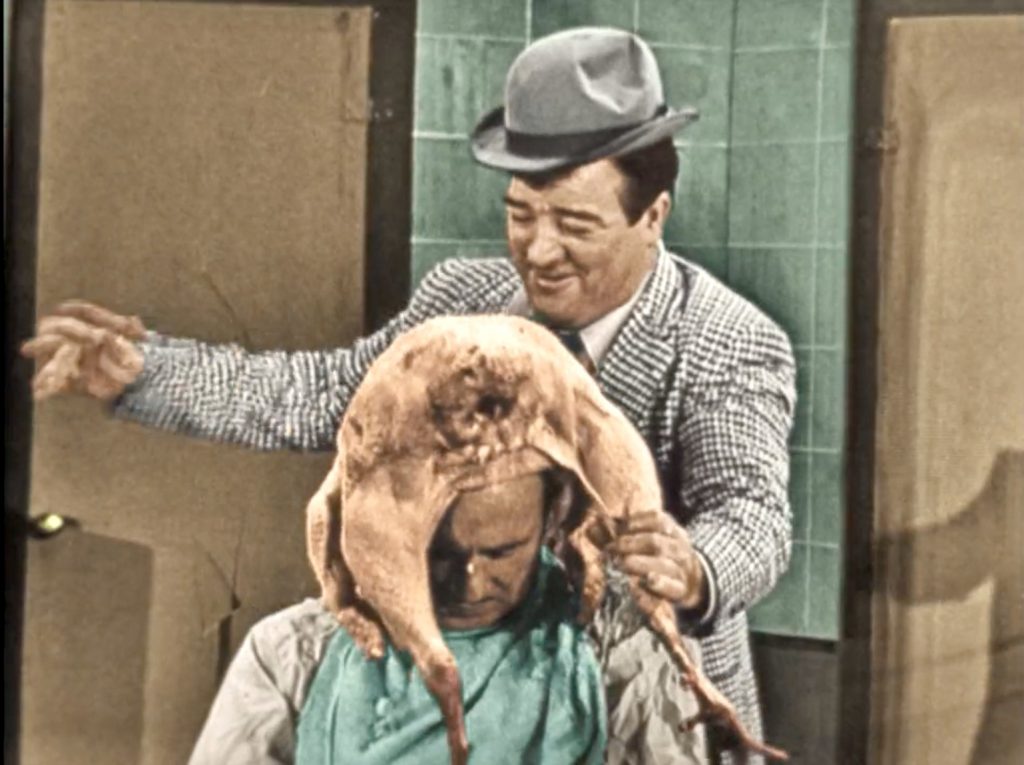 Lou Costello stuffs a turkey with Bud Abbott head!