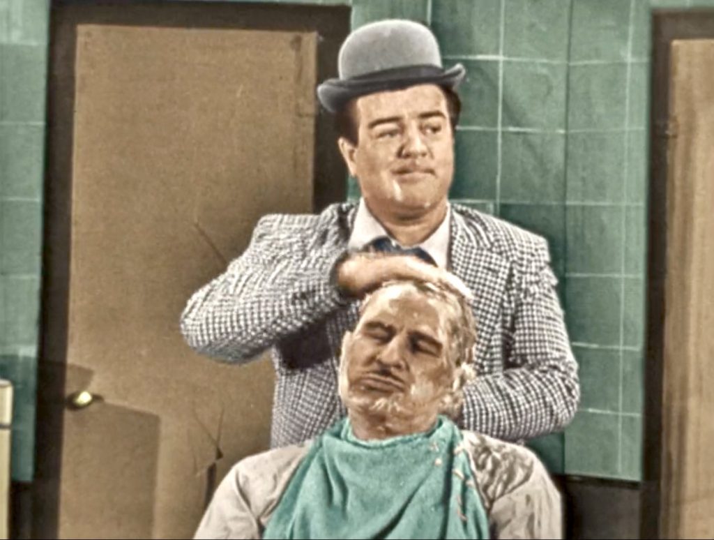Lou Costello gives Bud Abbott in Abbott & Costello - The Christmas Show