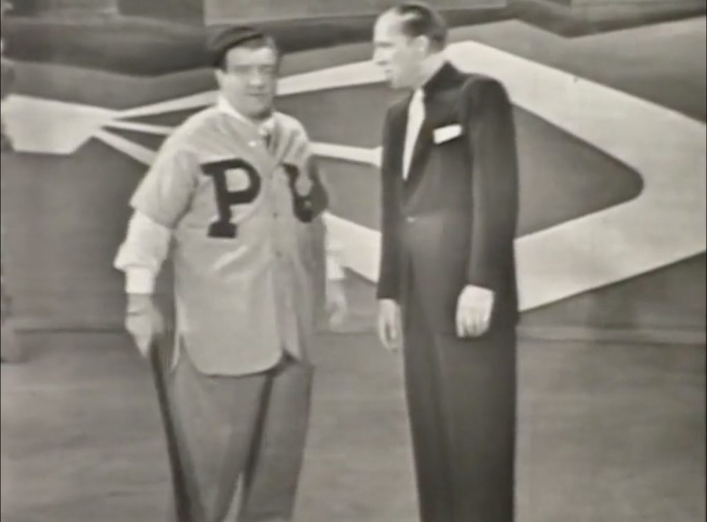 Lou Costello and Bud Abbott do the classic Who's on First baseball routine