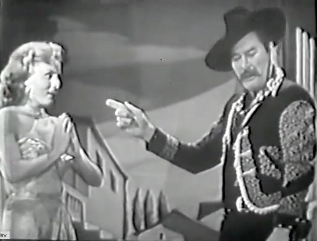 Black Pedro (Errol Flynn) is insanely jealous of Rhonda Fleming!