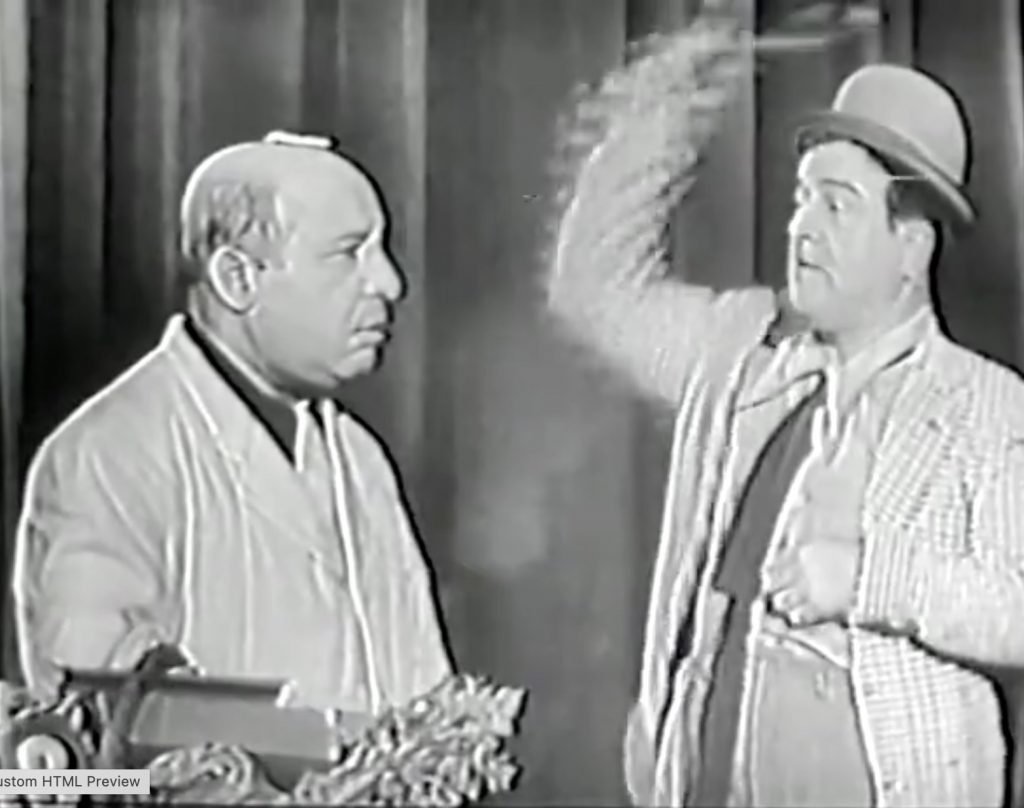 Lou Costello antagonizes Bobby Barber with celery on the head